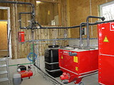 Draufsicht auf die Anlage mit Anmischbehälter, Brauchwassertank und hygienischem und lichtundurchlässigem Frischwassertank.